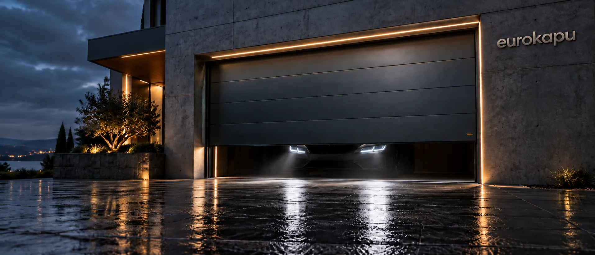 Anthracite wide-ribbed garage door lit at dusk, with a car's headlights behind it